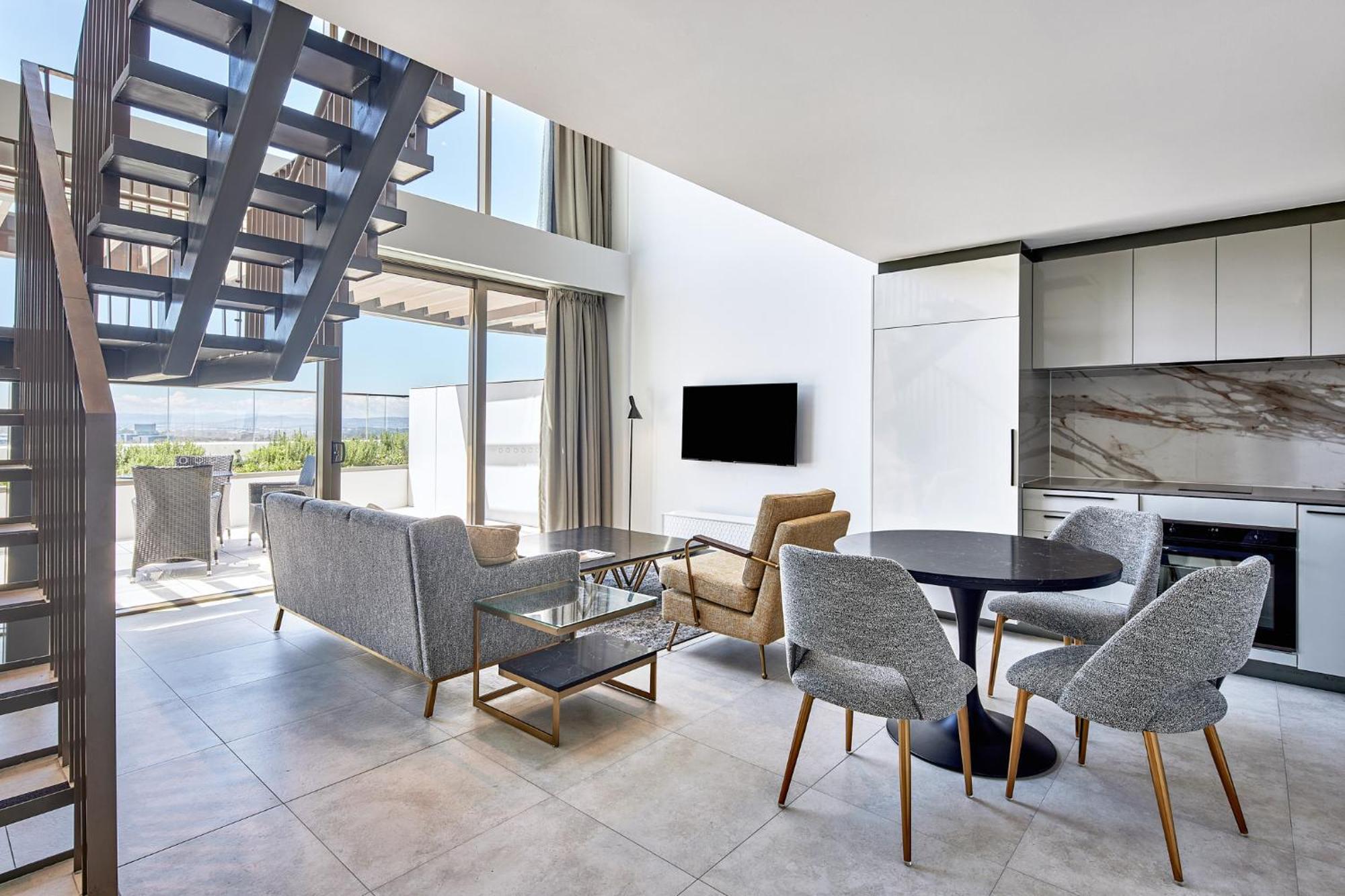 Meriton Suites Canberra Eksteriør billede A living room at the hotel
